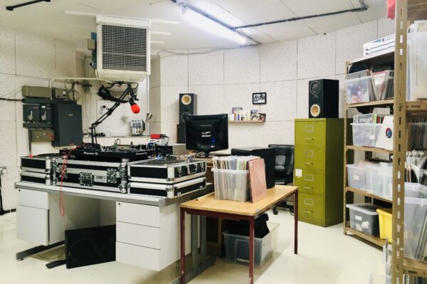 Recording studio with microphones, tables and chairs