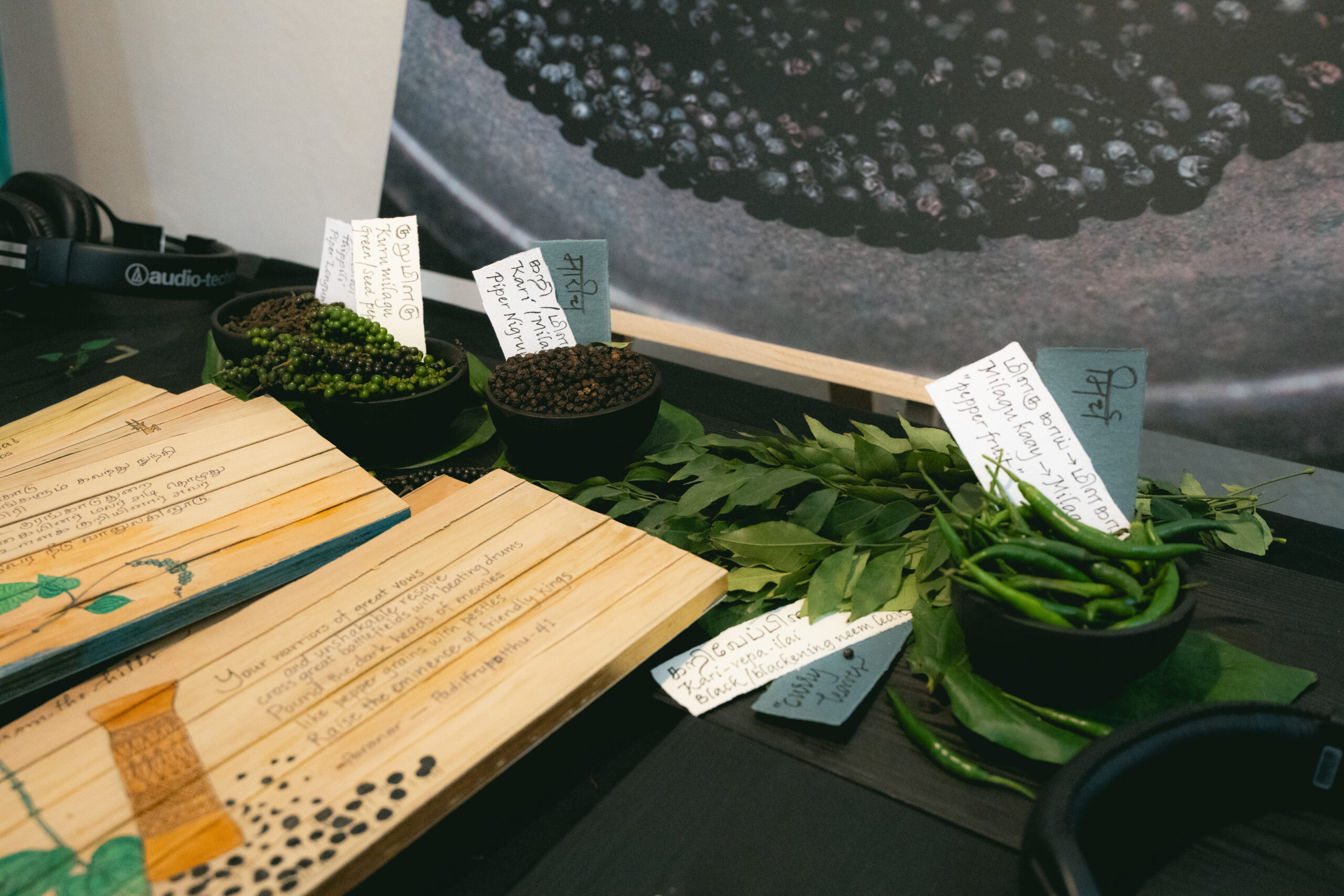 Artwork and spices laid out on a table