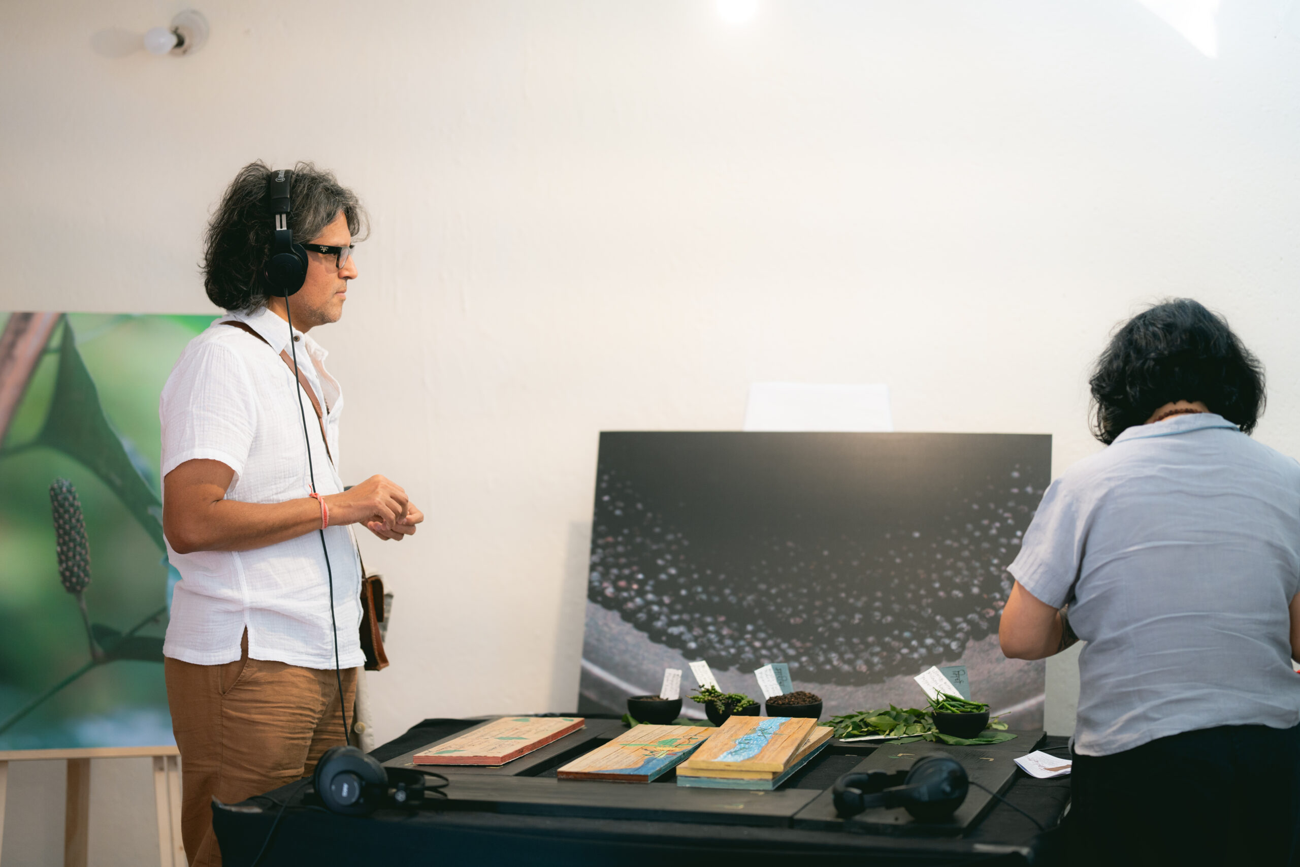 Two people listening to soundscape with headphones